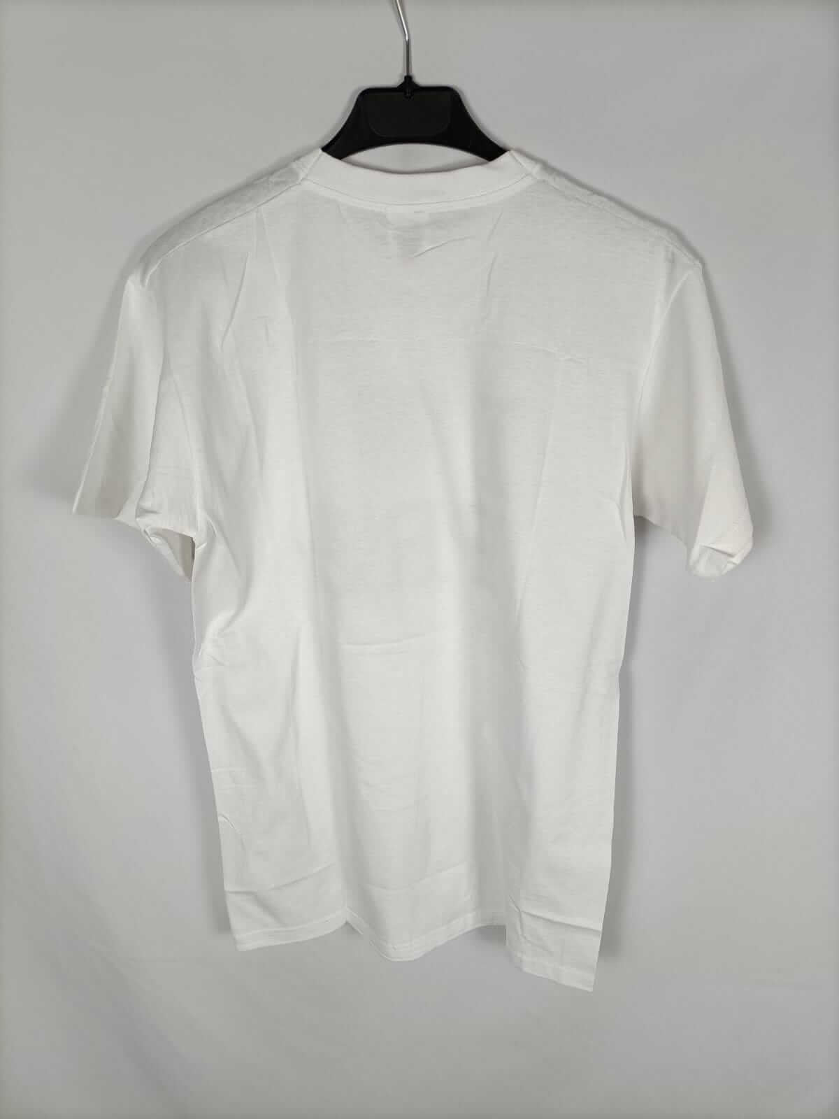 OTRAS. Camiseta blanca letras T.s