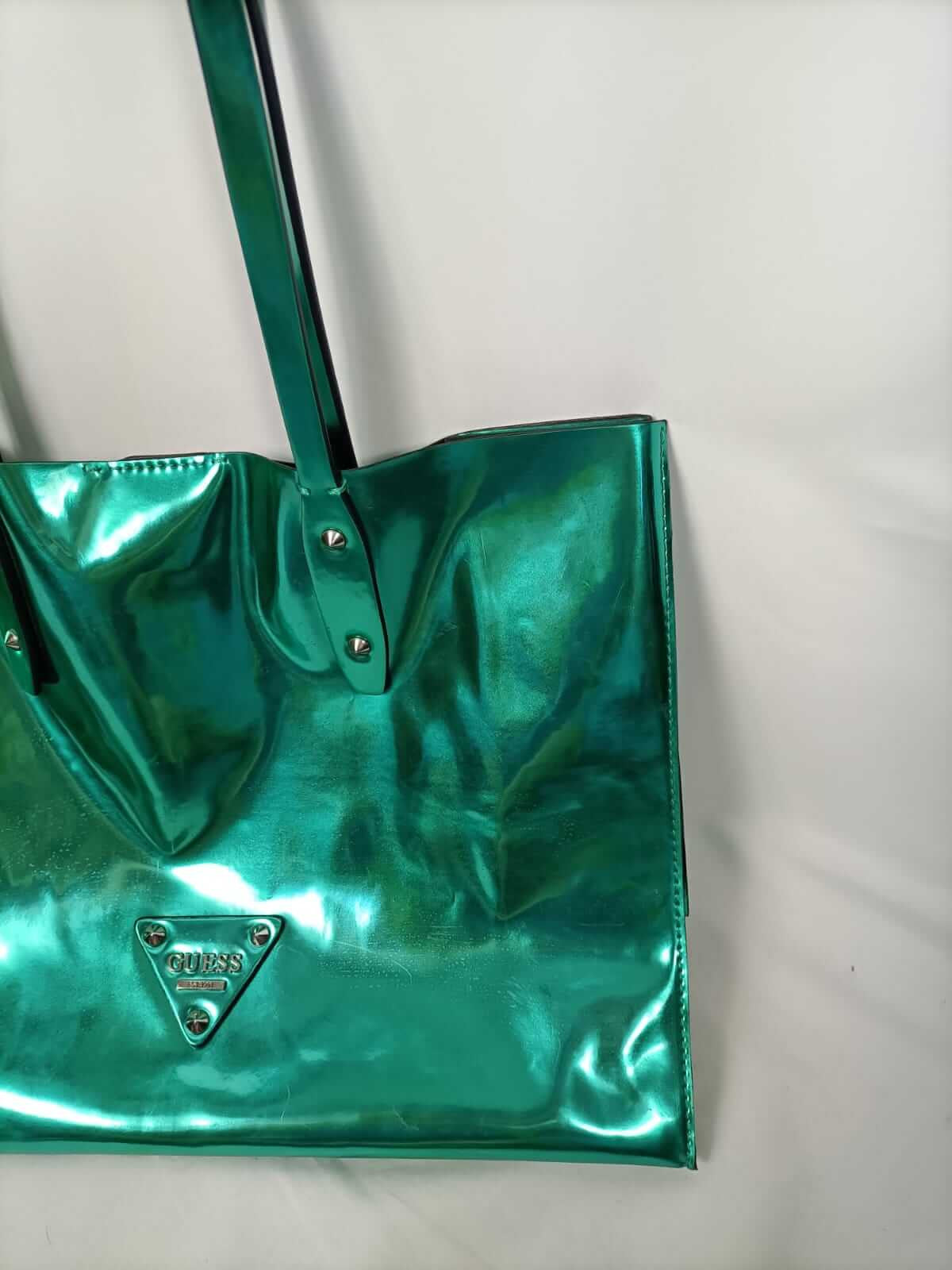 GUESS. Metallic bag