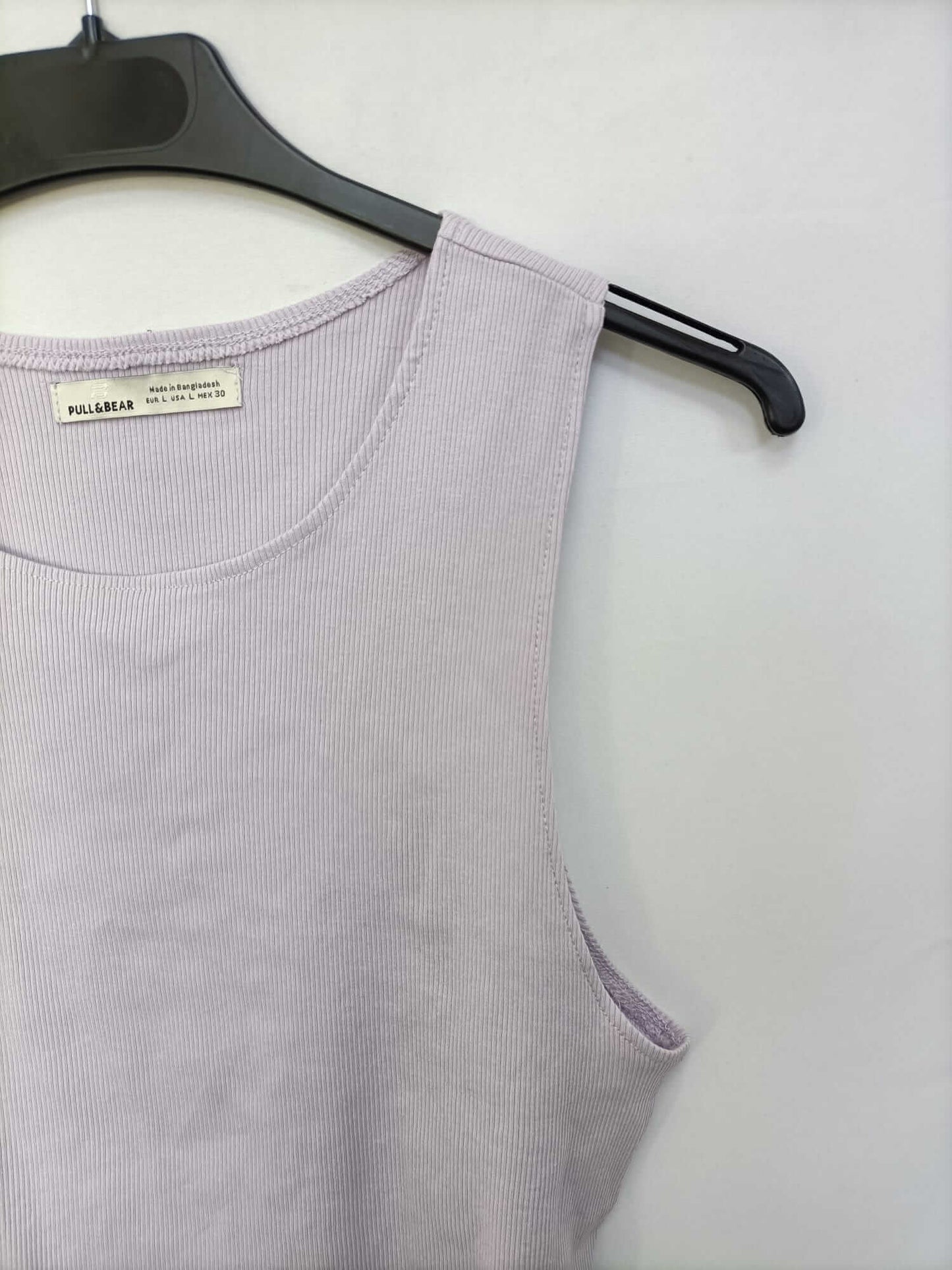 PULL&BEAR.Top lila canalé T.L