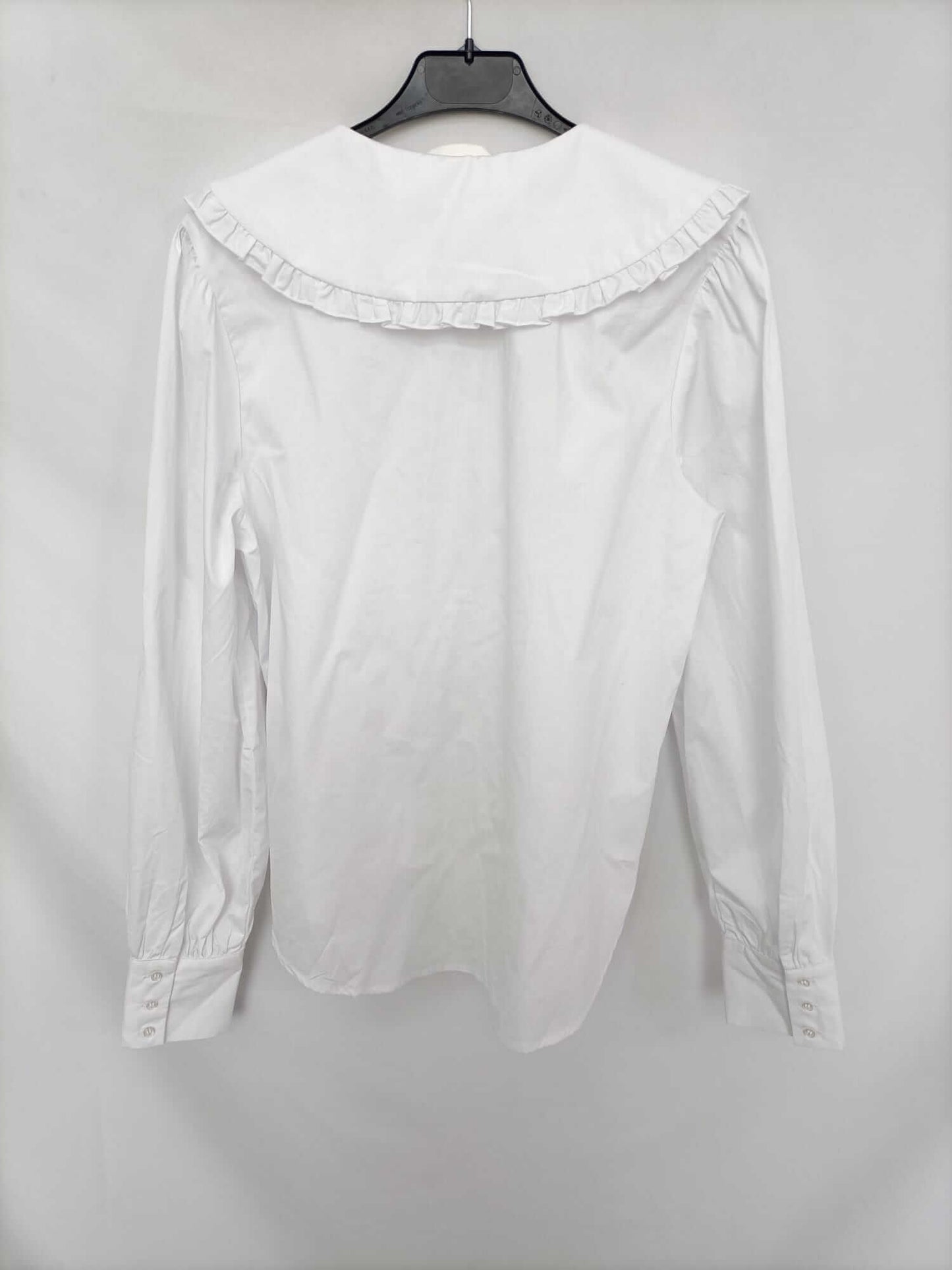 h&M. Blusa blanca cuello bebe T.s