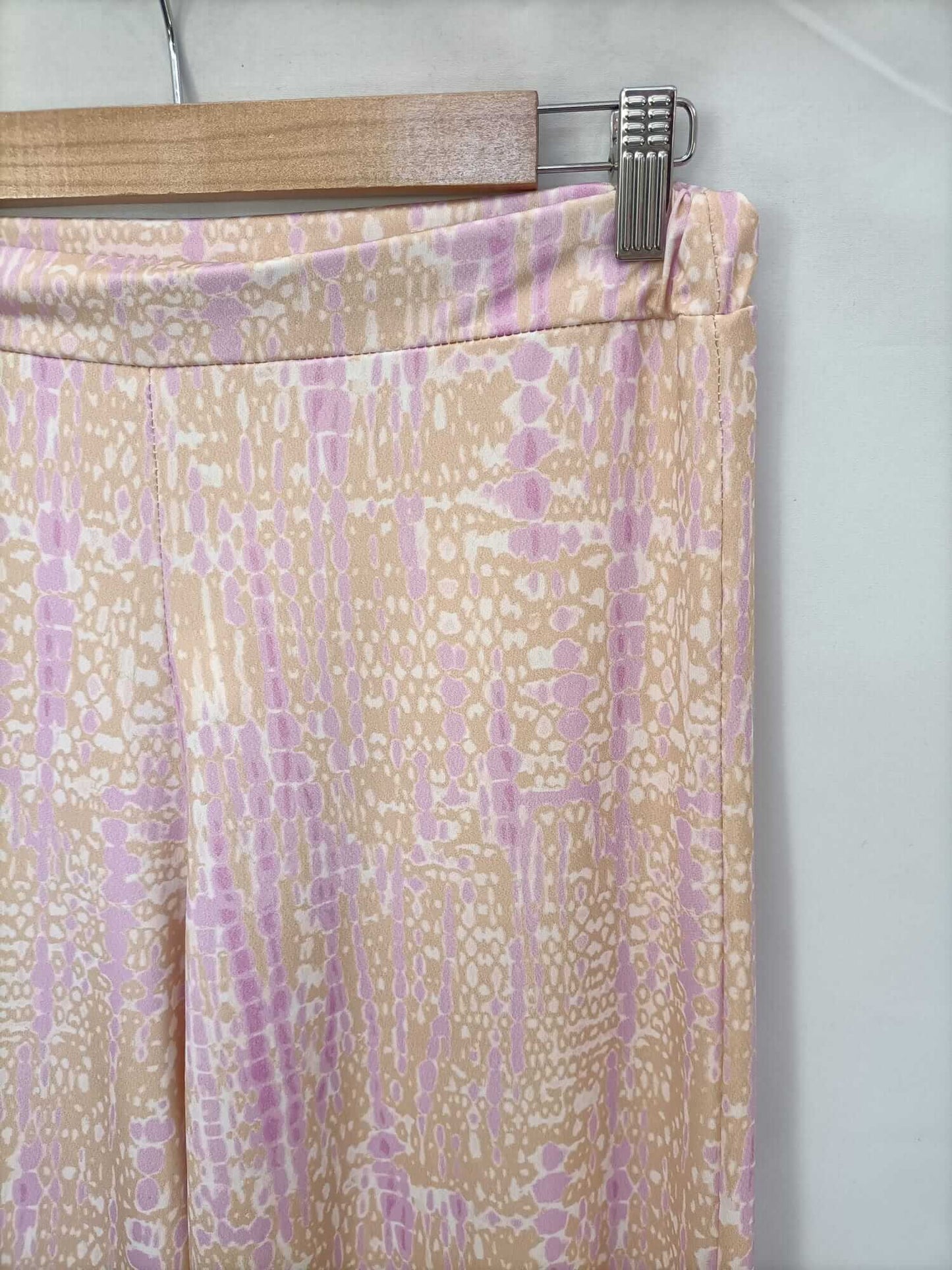 PINPON LILI. Pink and orange printed pants (m/l)