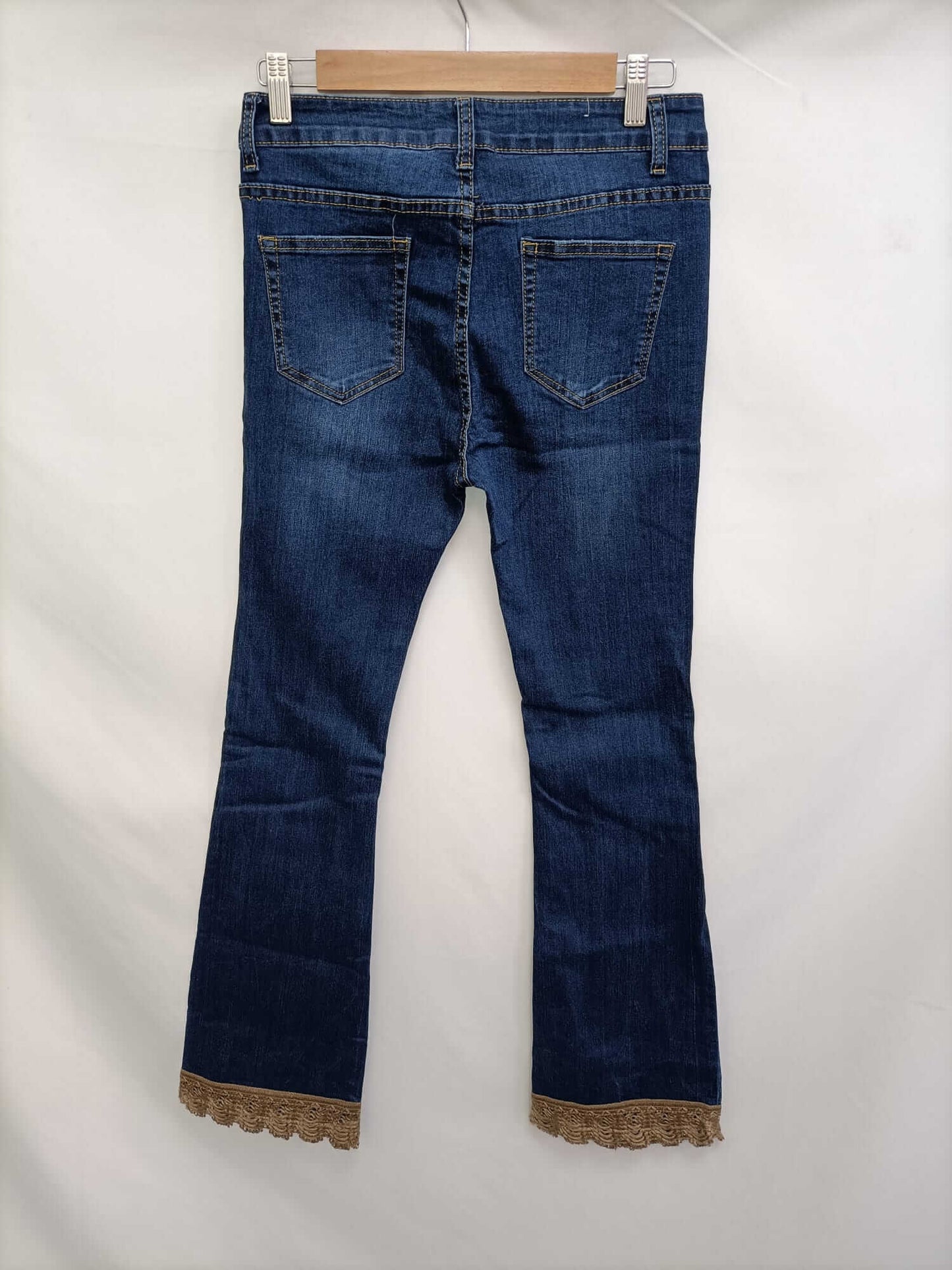 MANZANA. Trousers with TL stitch detail