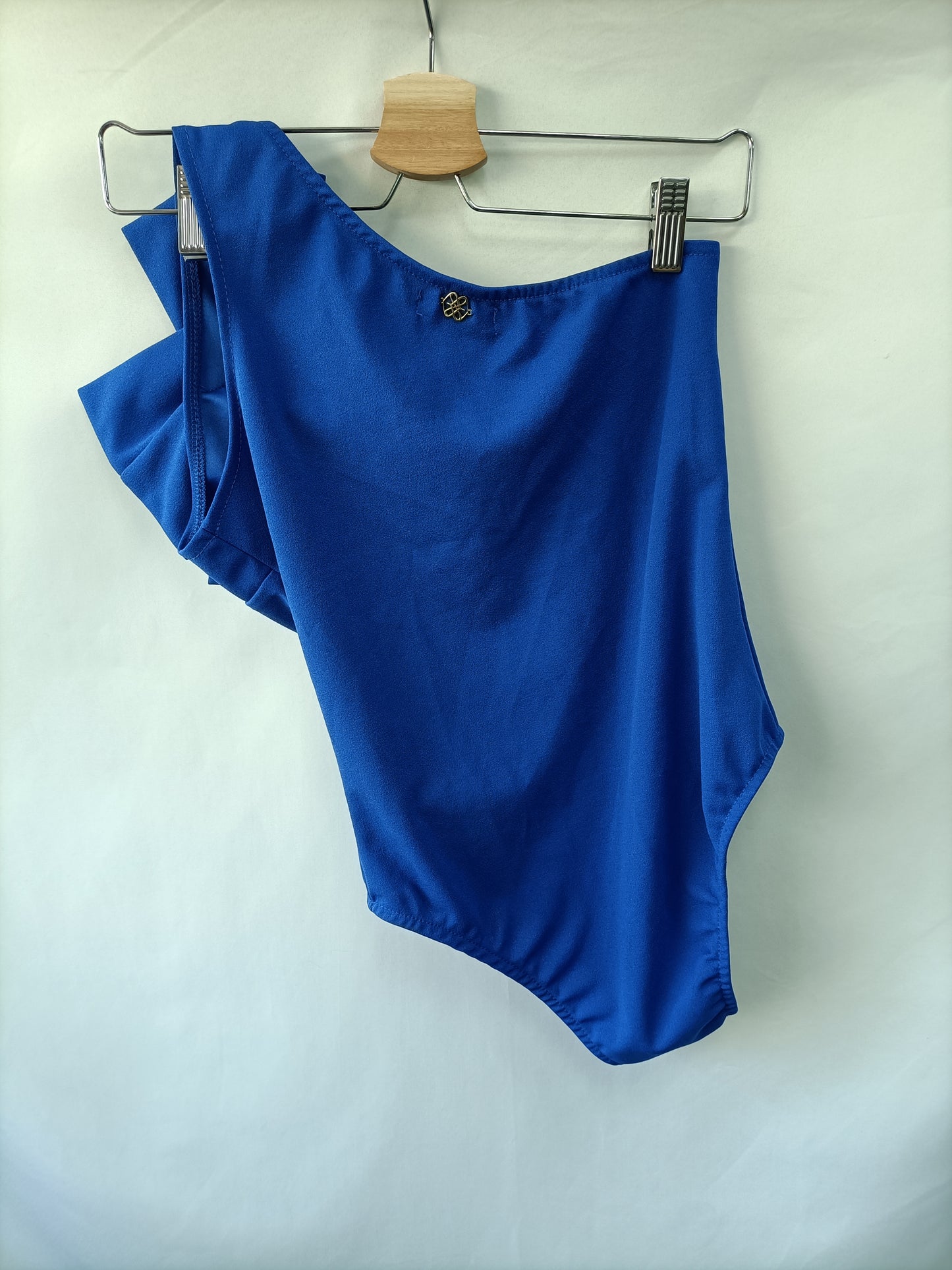 COUPLE. Blue bodysuit with bow T.xs