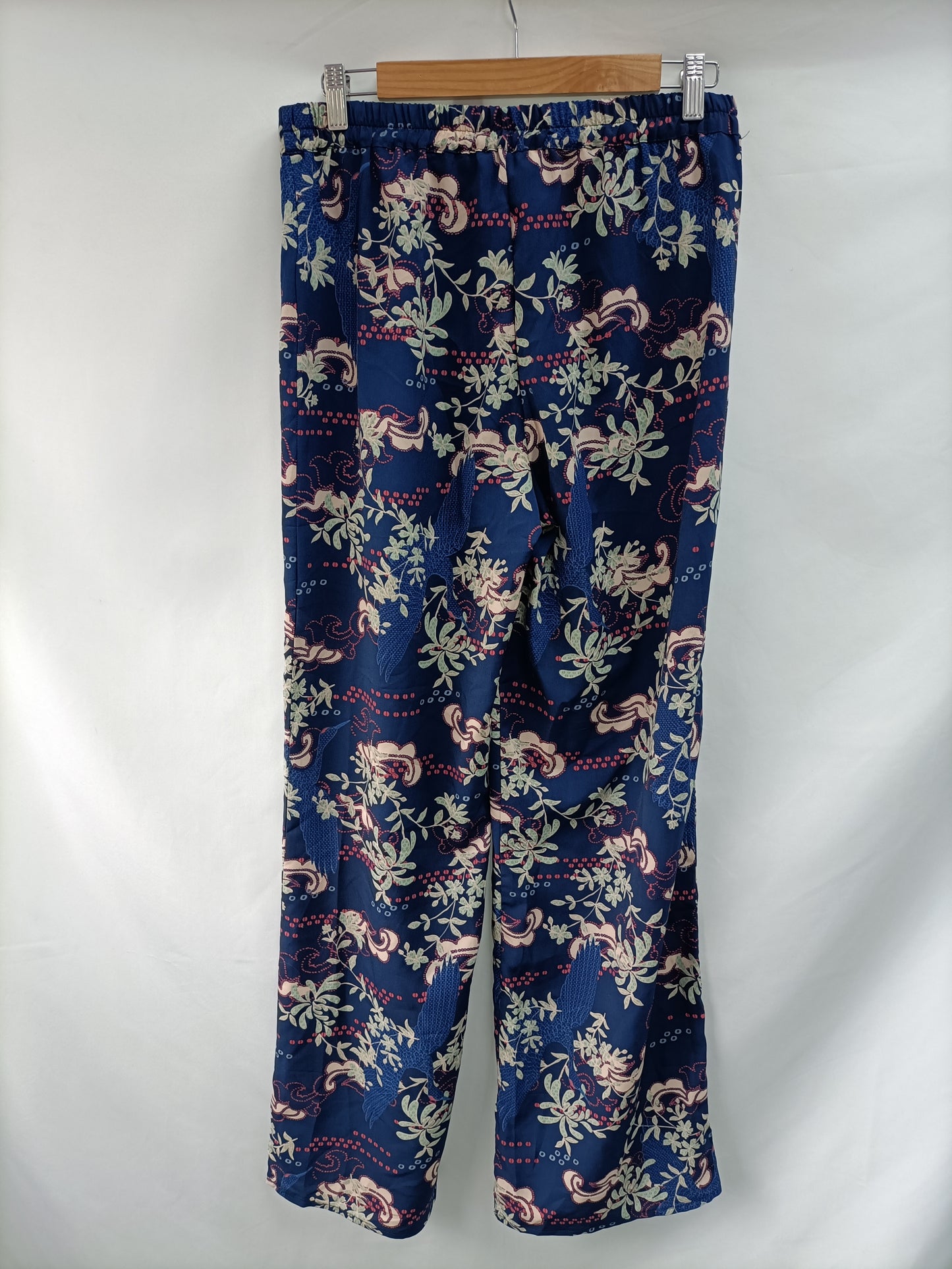 AMICHI. Pantalón azul flores T.m