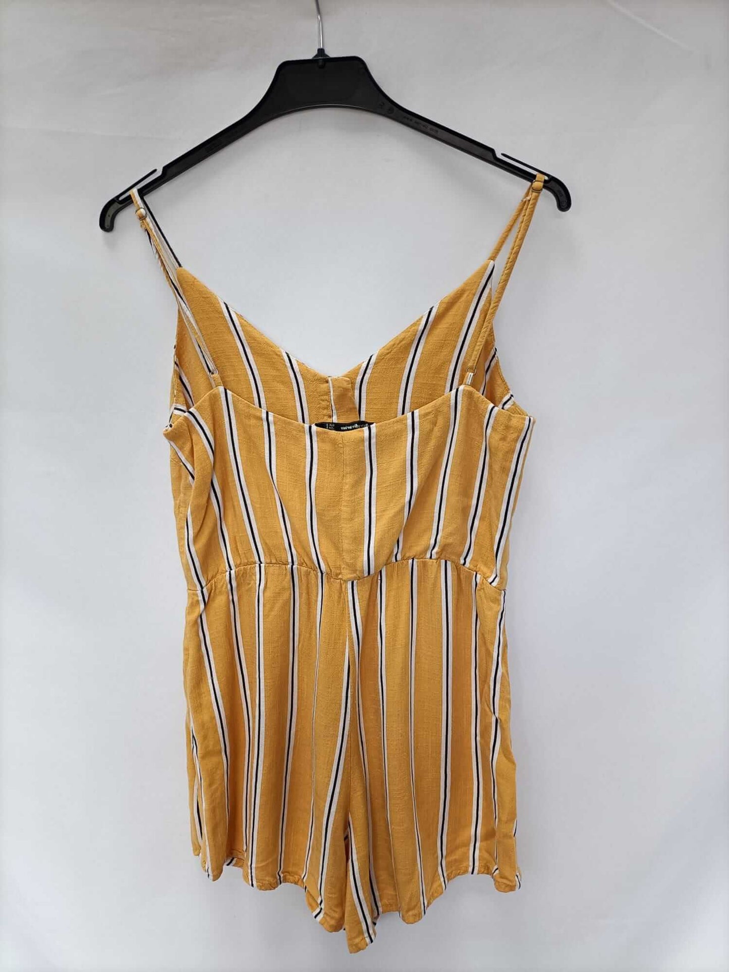 STRADIVARIUS.Yellow striped short jumpsuit Ts