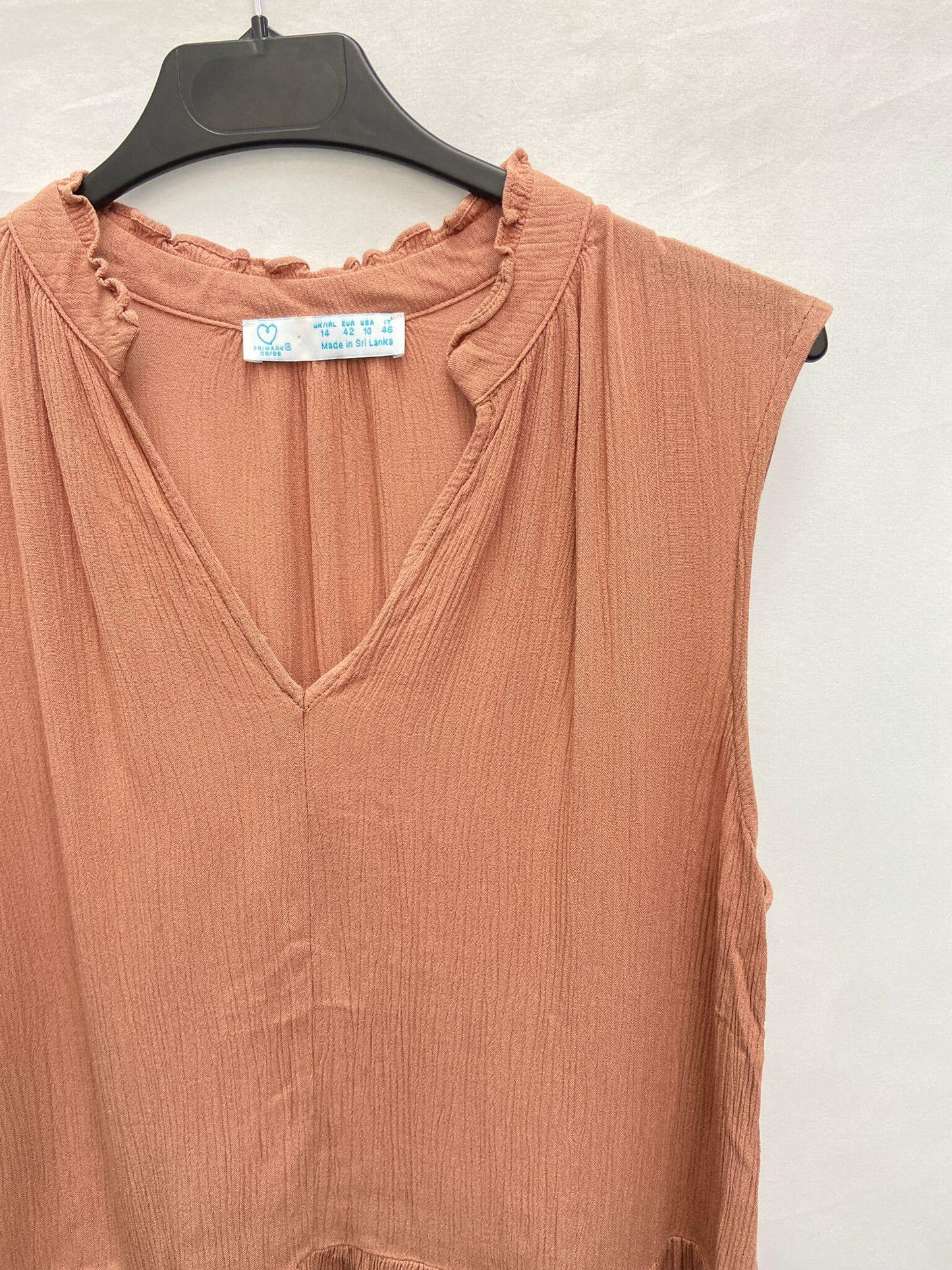 PRIMARK.Blusa texturacolor maquillaje T.42