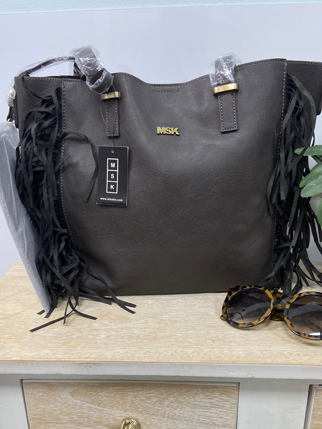 Dark brown fringed bag