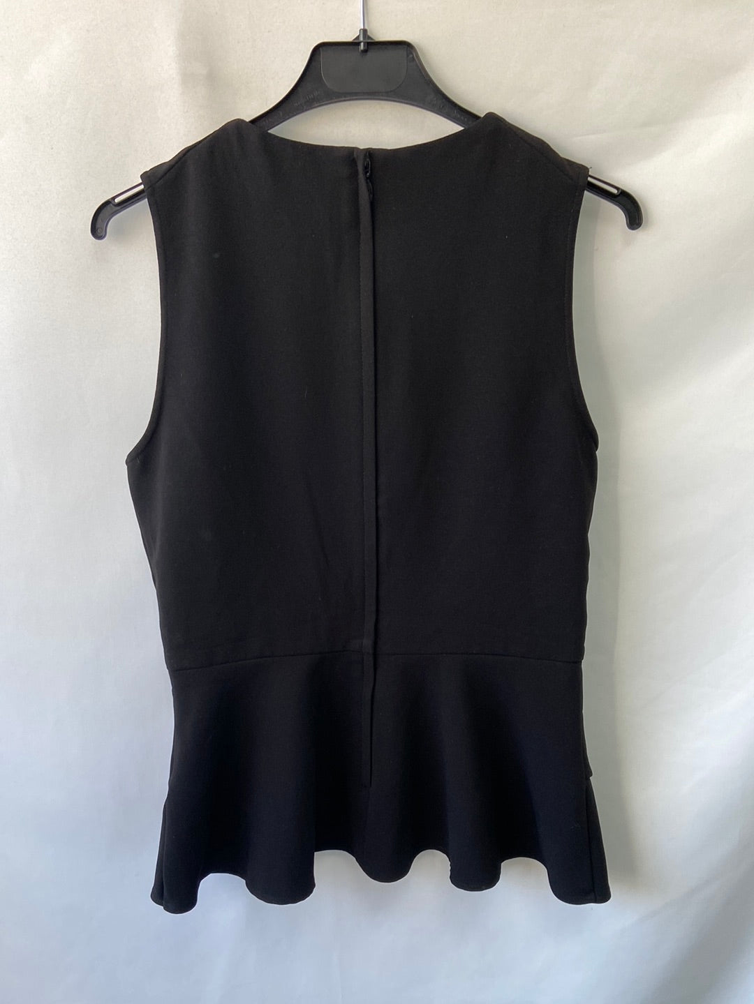H&M. Black top with ruffles, size 40