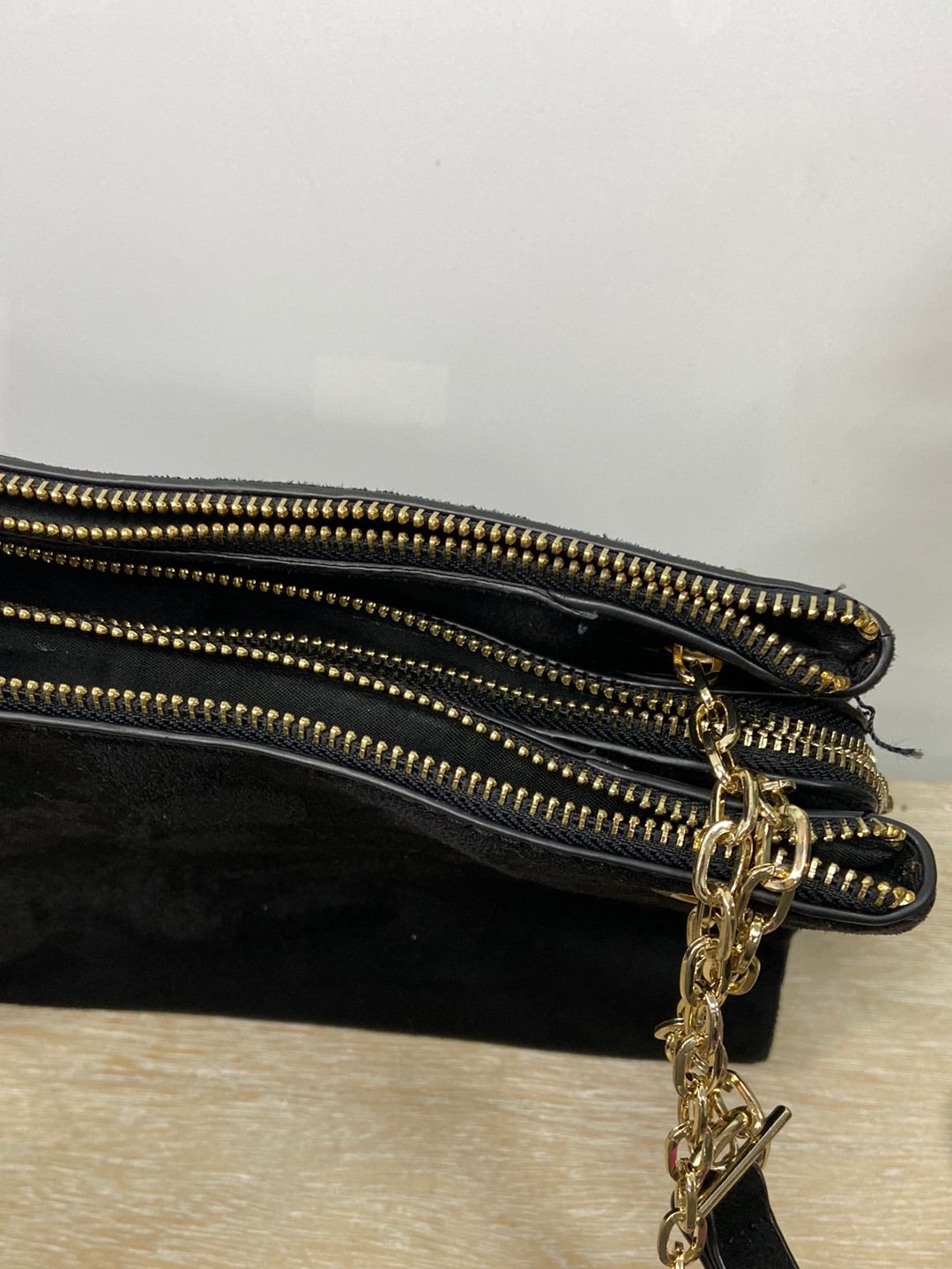 PARFOIS. Black suede bag