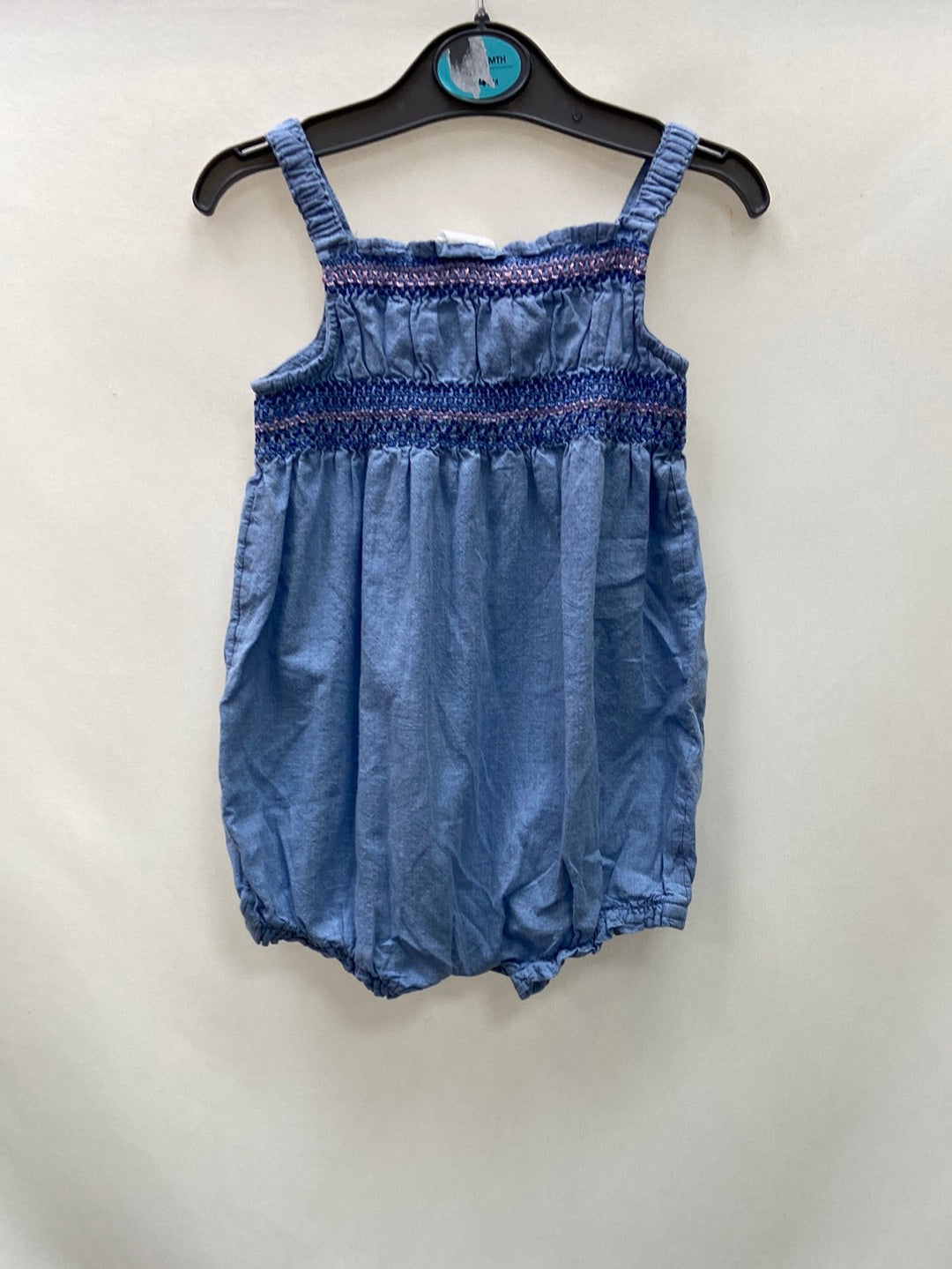 H&M. Denim bodysuit T4-6 months
