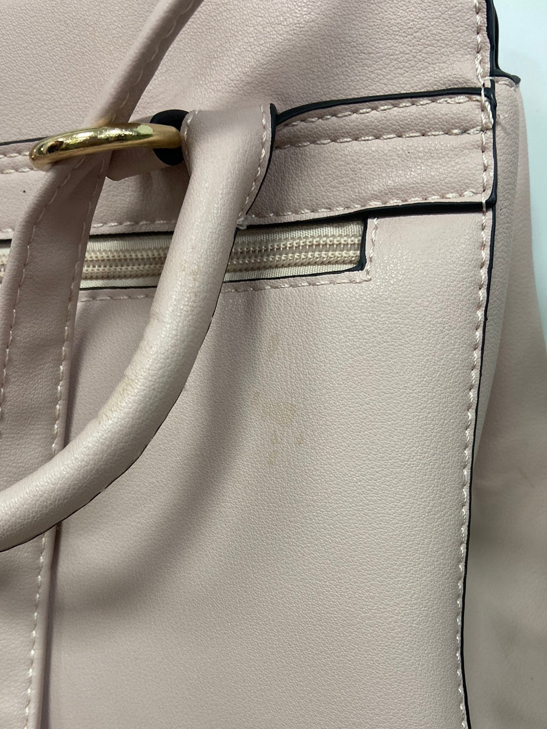 Market.OTRAS.Mochila rosa tipo bolso (Tara)