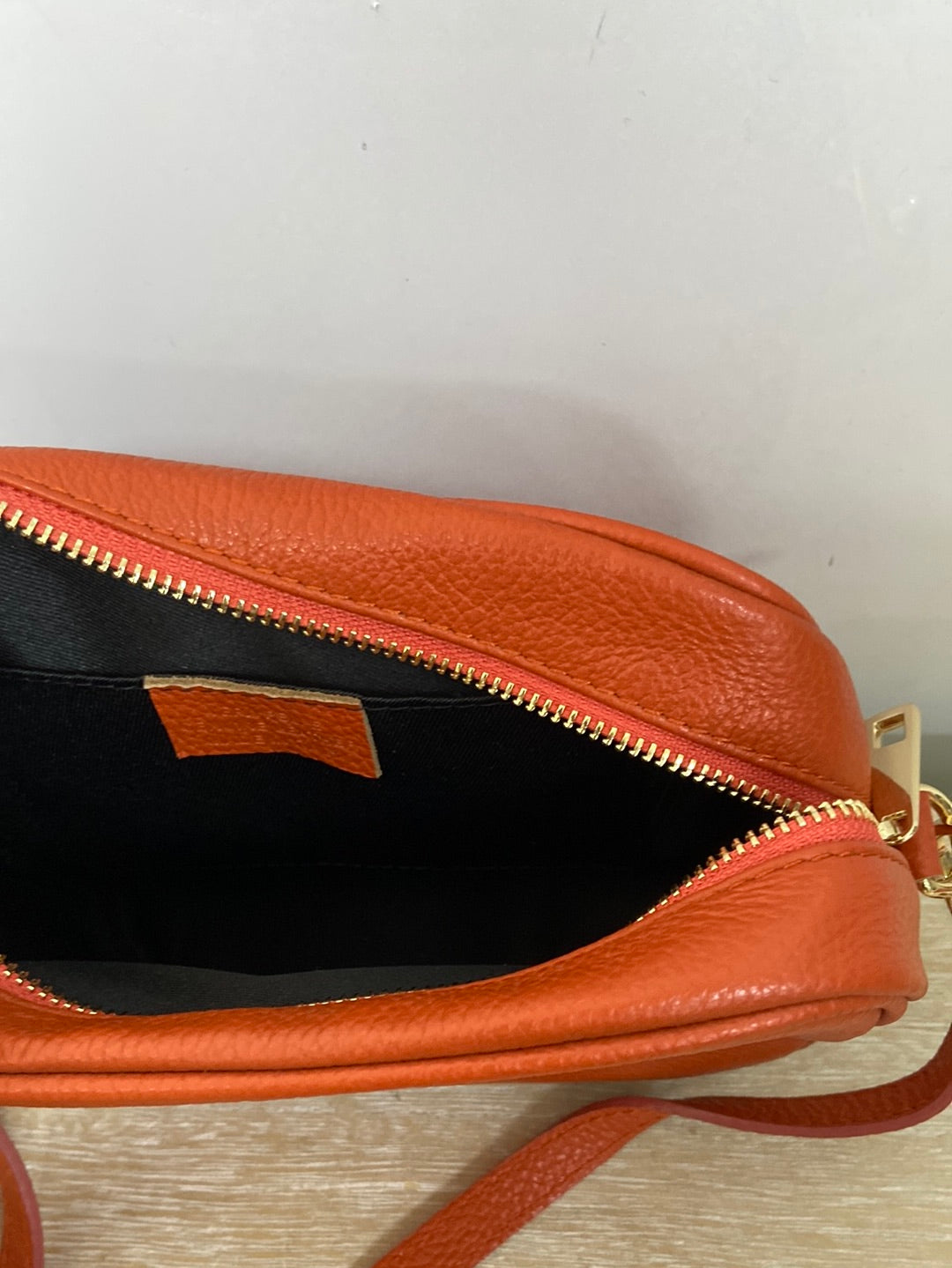 OTHERS. Orange leather bag
