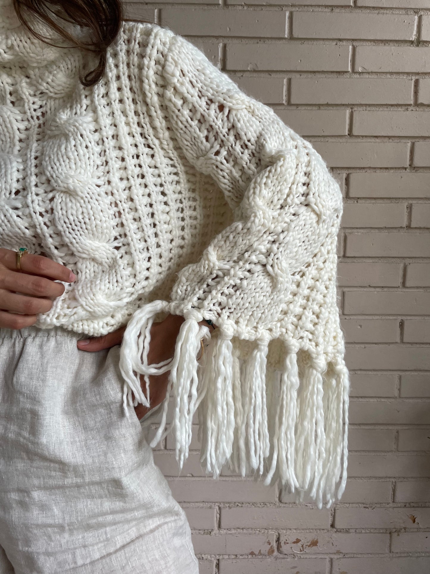 OTHERS. Your chunky fringed sweater