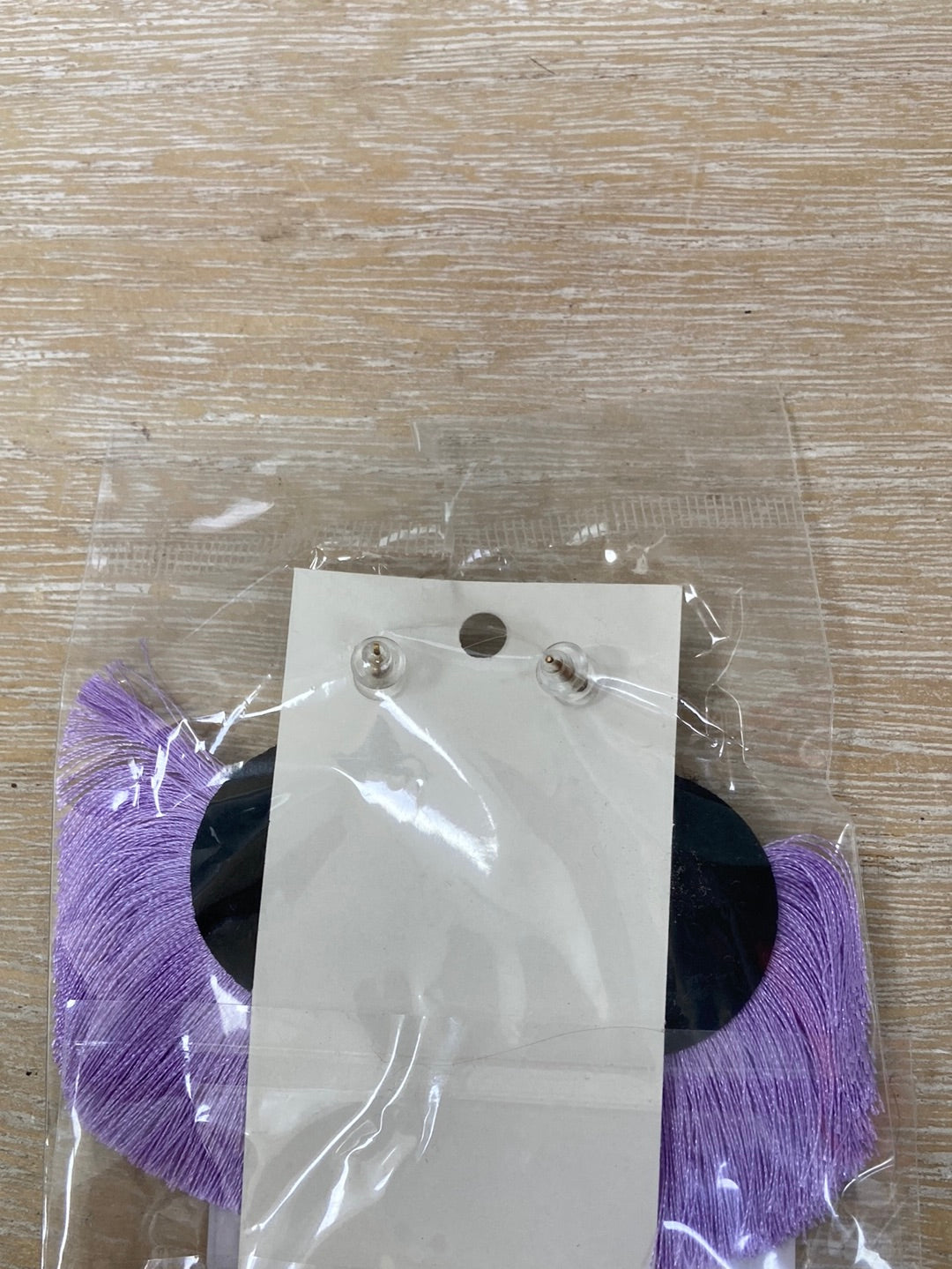 OTRAS.Pendientes morados flecos