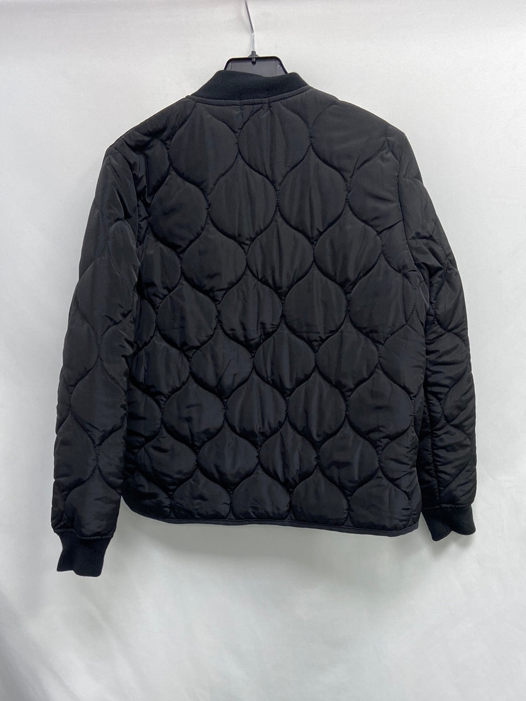 TERIA YABAR.Plumas negro ligero T.M