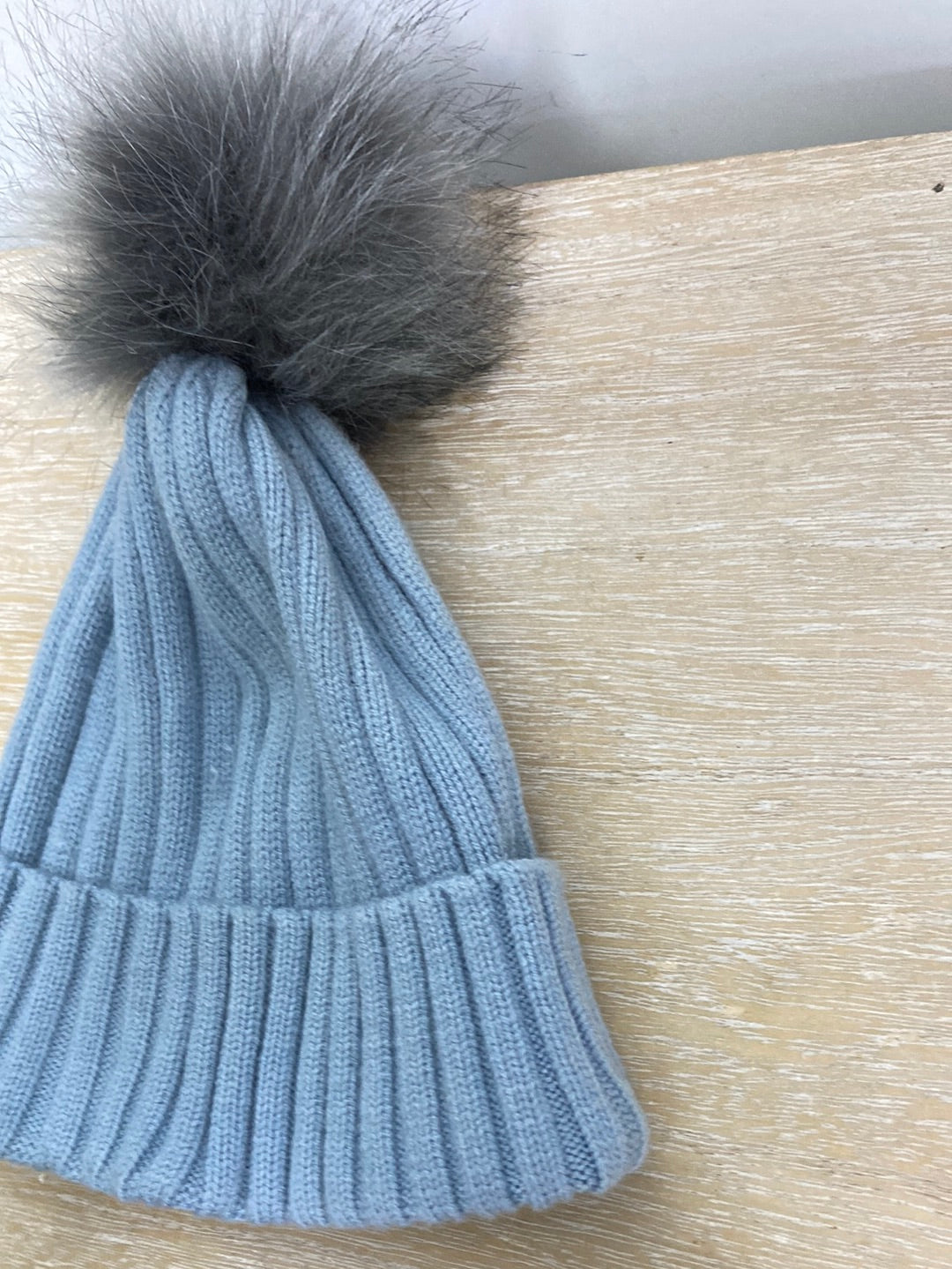 PRIMARK.Gorro azul pompón