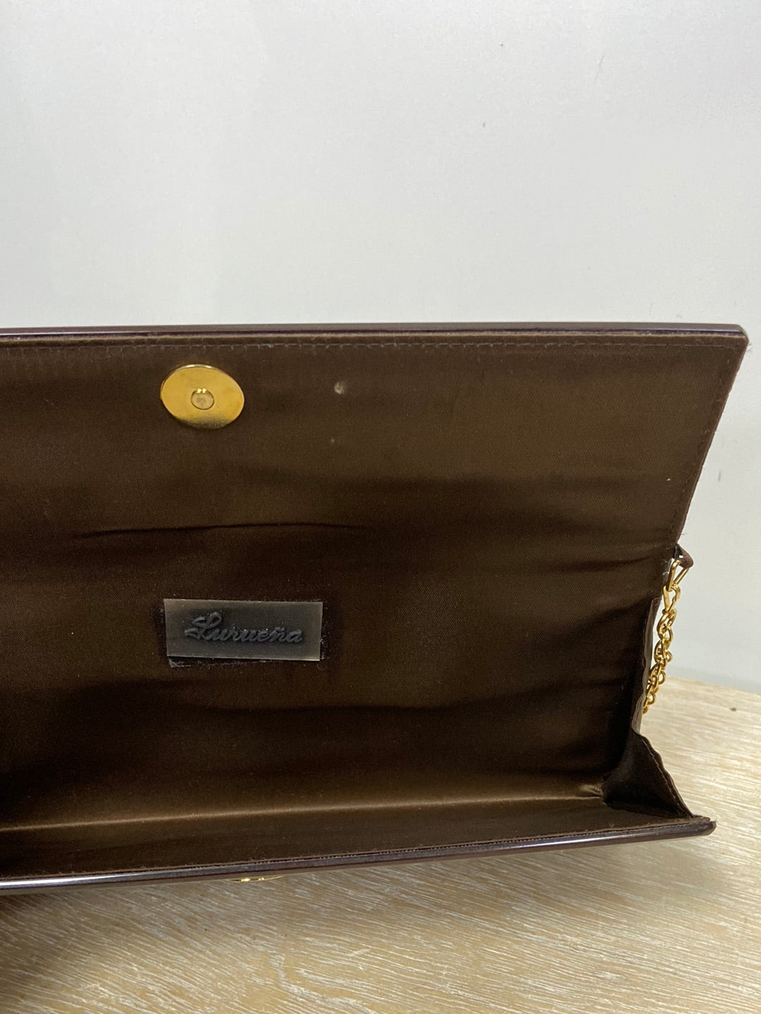 LURUEÑA. Brown mother-of-pearl bag