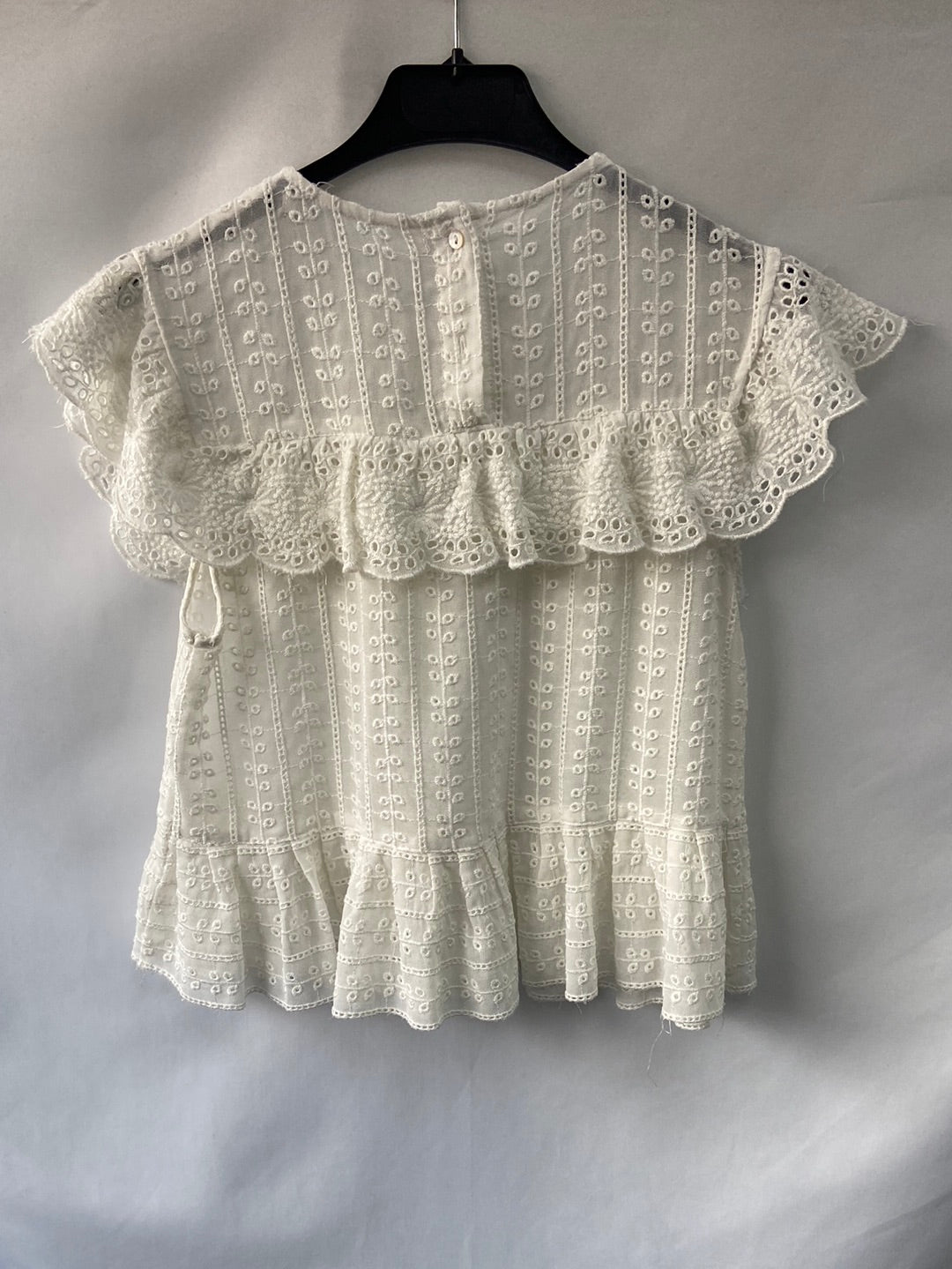 OTRAS.Blusa blanca troquelada T.xs