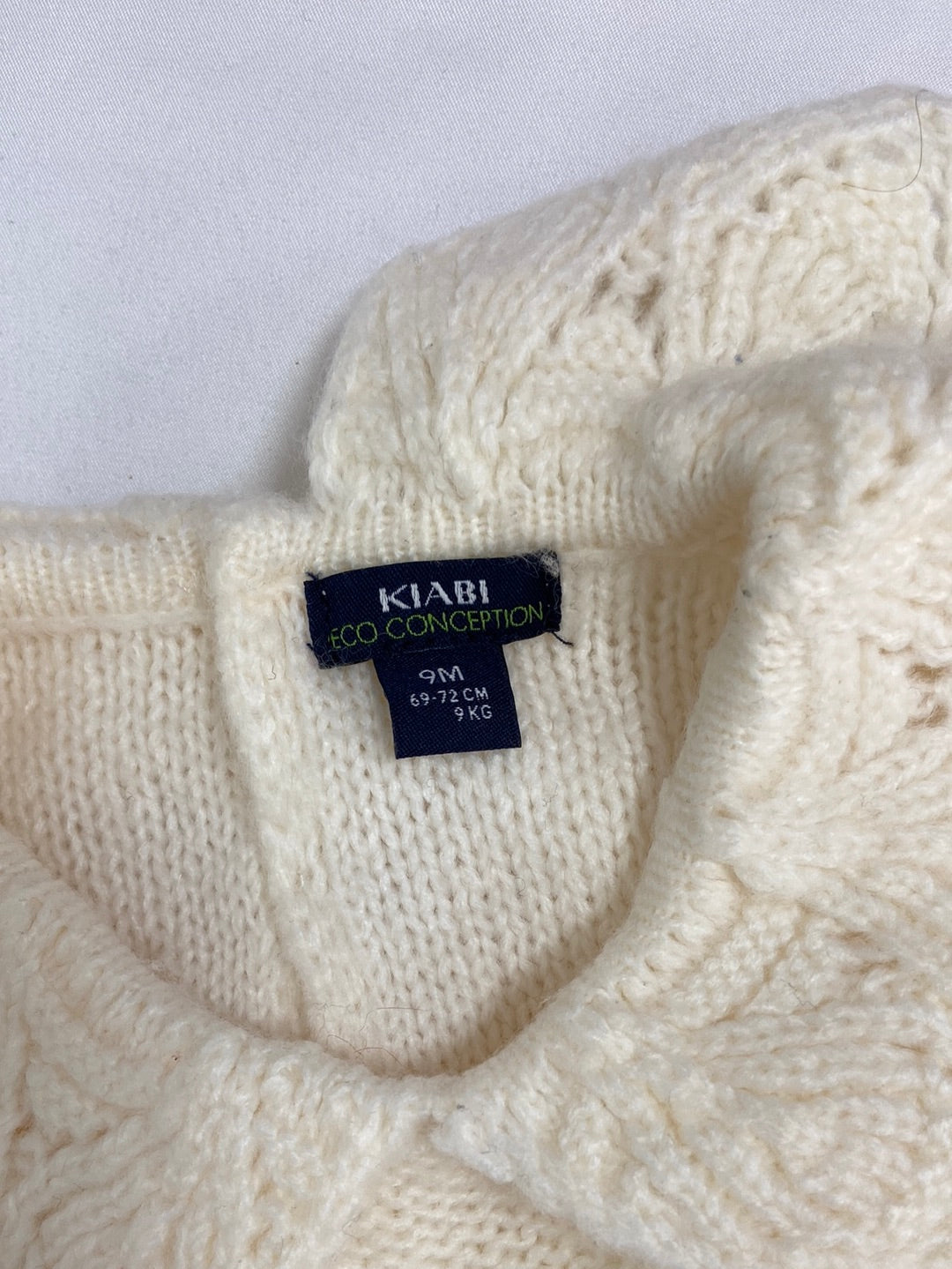 KIABI.Jersey beige cuello 9 meses