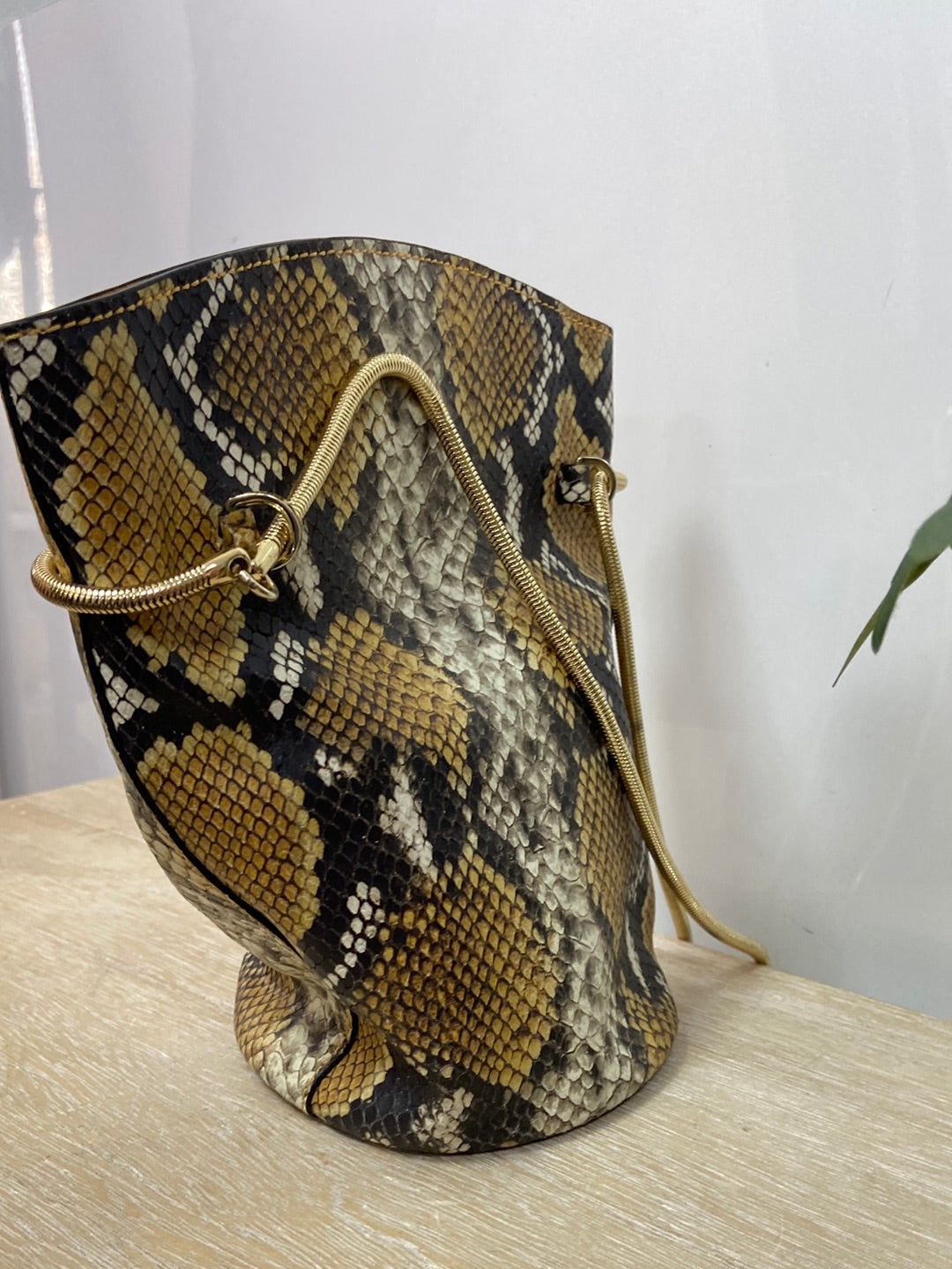 GEORGES RECH. Snake print sack bag