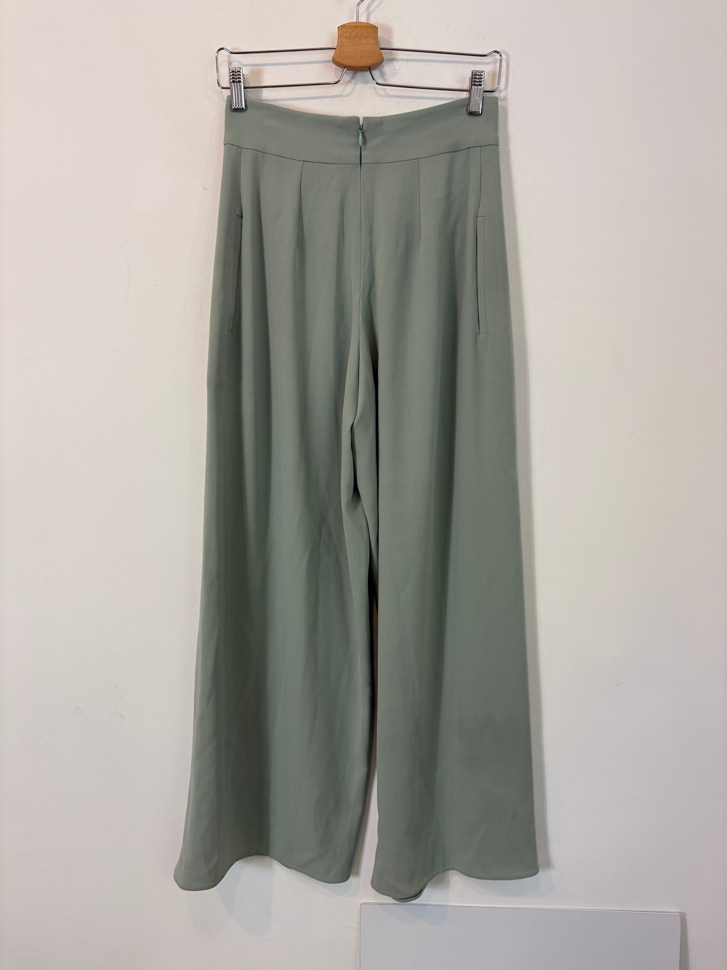 ROBERTO TORRETTA. Green trousers with slits. Size 36