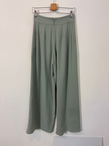 ROBERTO TORRETTA. Green trousers with slits. Size 36
