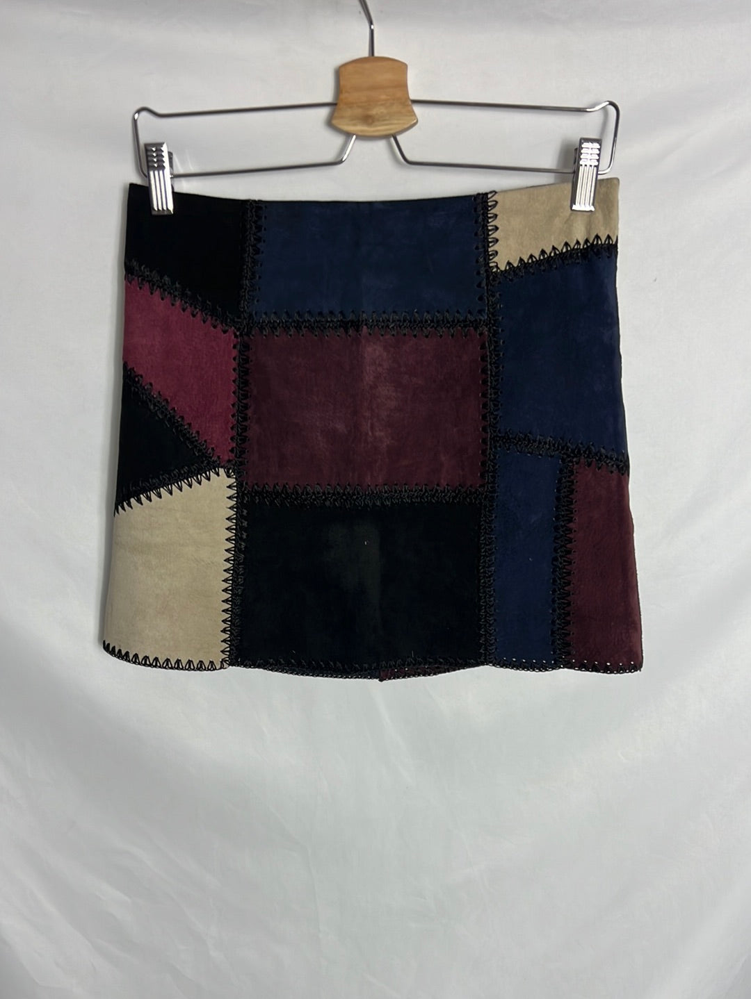 ZARA. Short leather patchwork skirt. TS