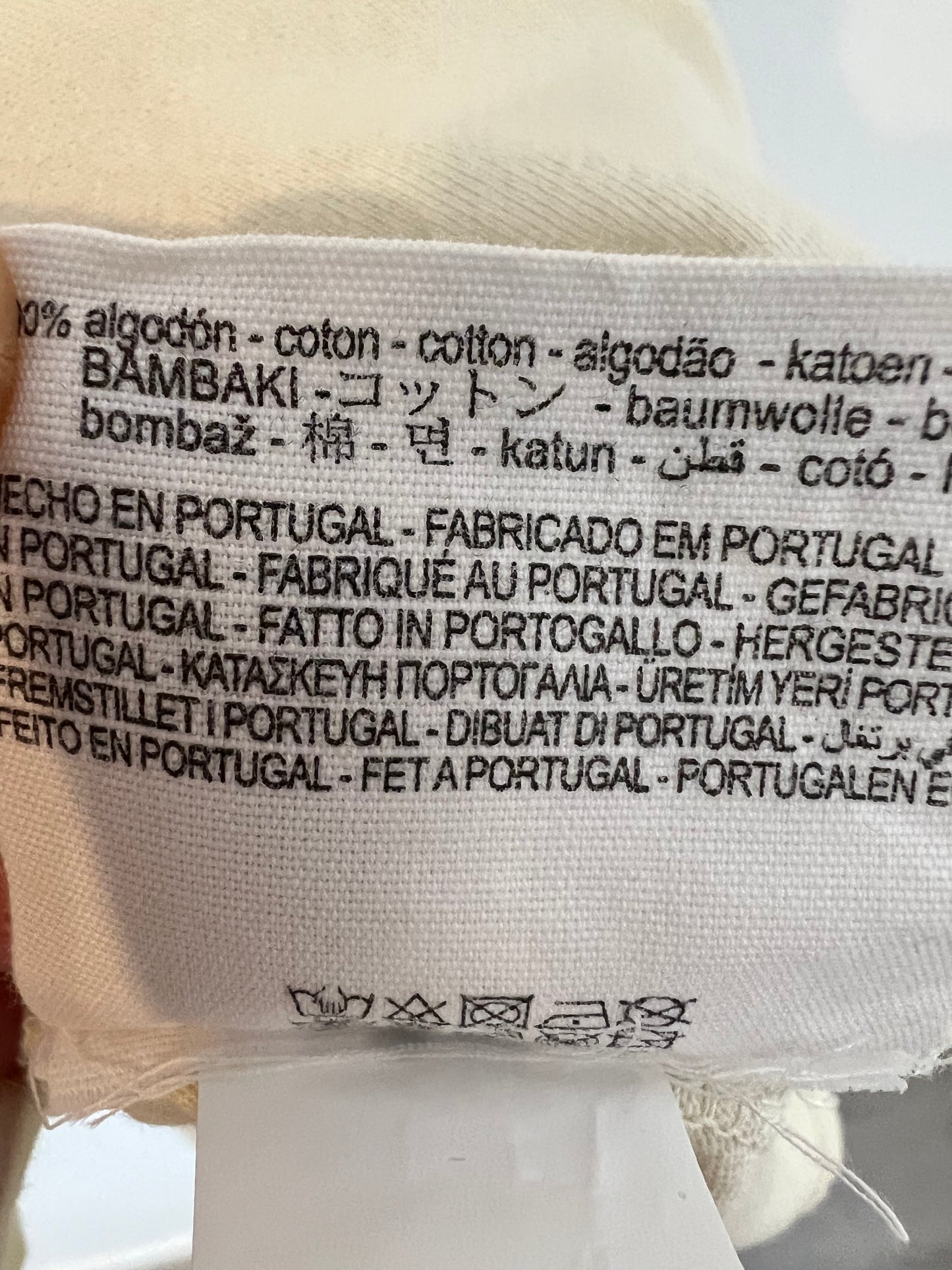 ZARA. Camiseta beige hombreras. T L