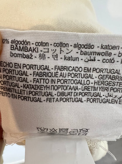 ZARA. Camiseta beige hombreras. T L