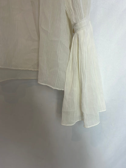 OTRAS. Blusa fluida plisada. T M