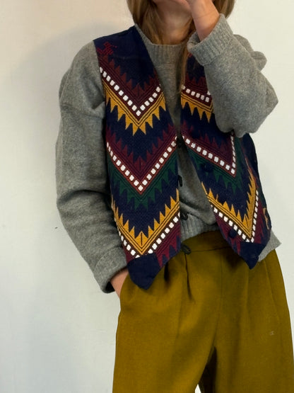 OTRAS. Chaleco azul bordado colores