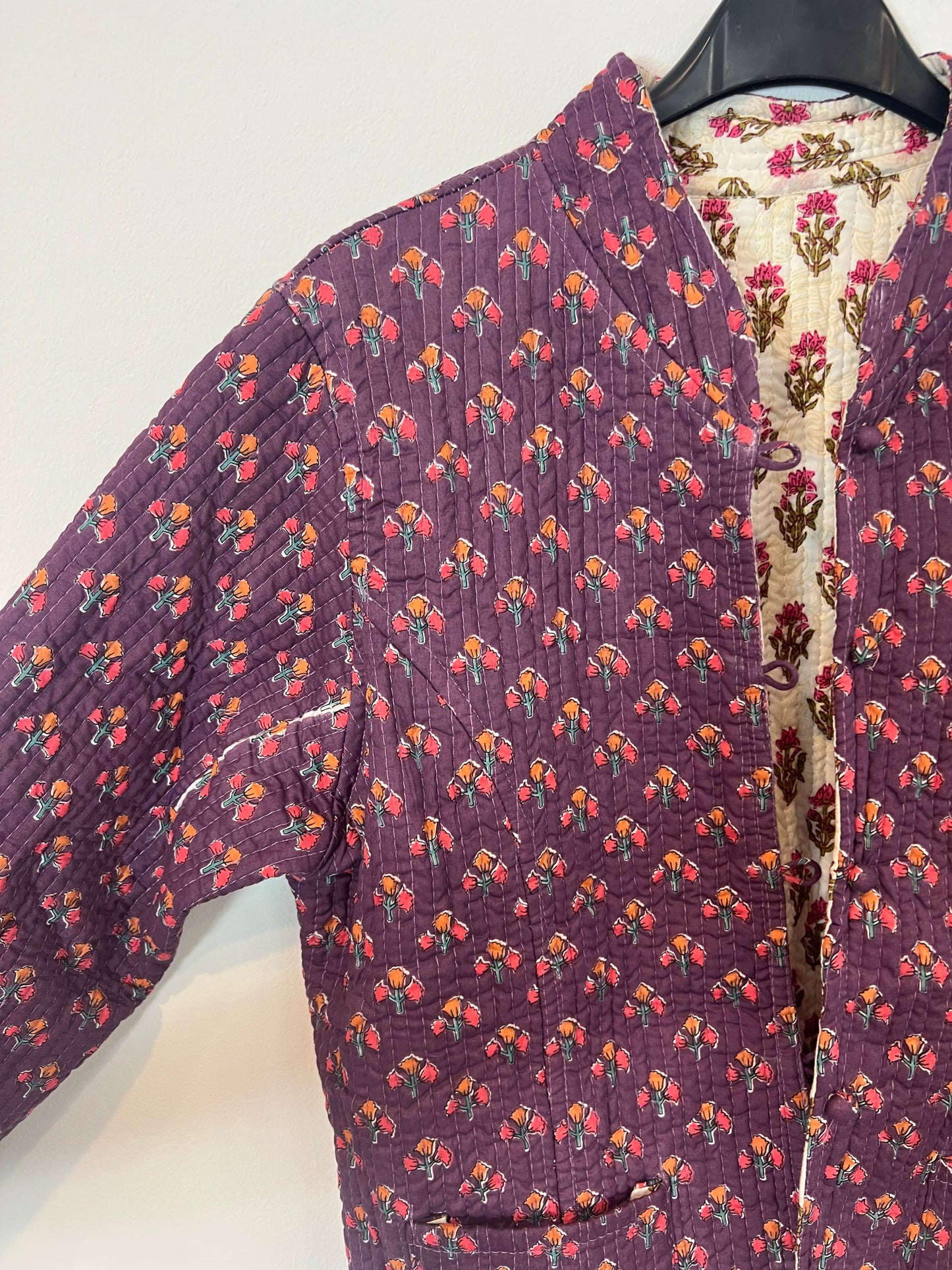 OTRAS. Chaqueta reversible flores T(u(xs/s)