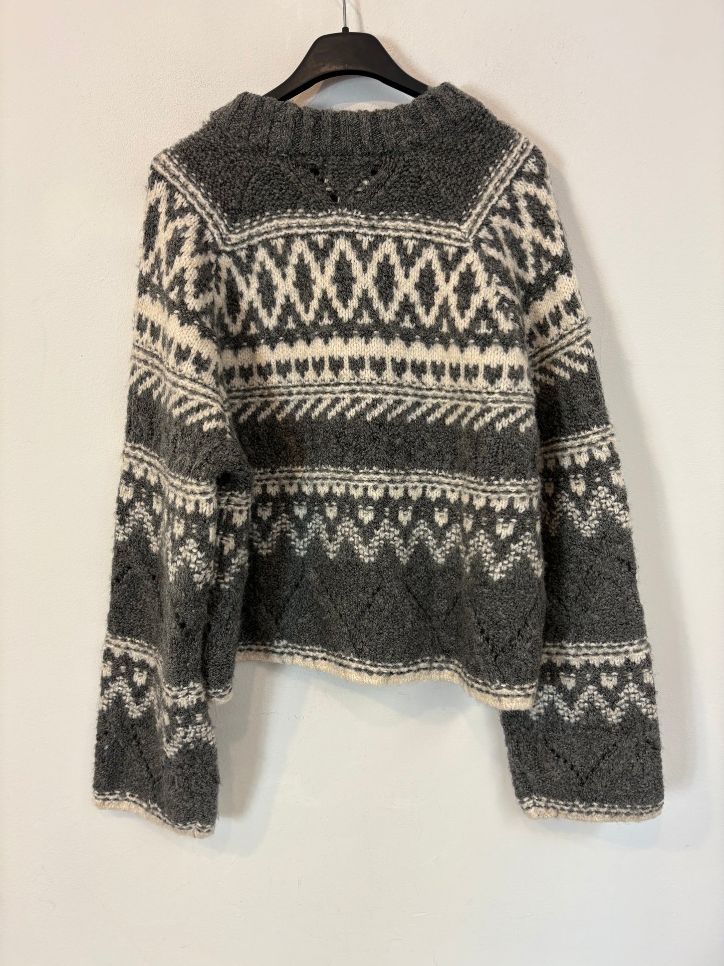 H&M. Jersey gris greca