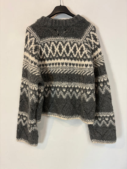 H&M. Jersey gris greca