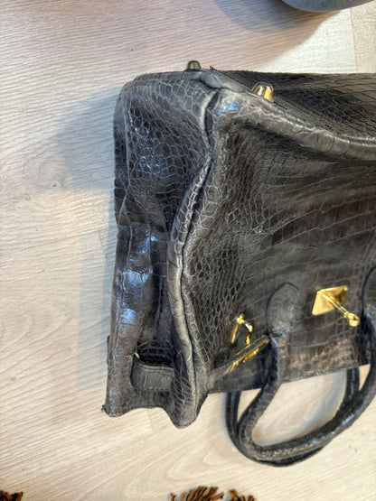 OTRAS. Bolso de mano gris piel