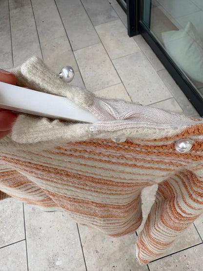 SESSÚN. Jersey beige bordados lana