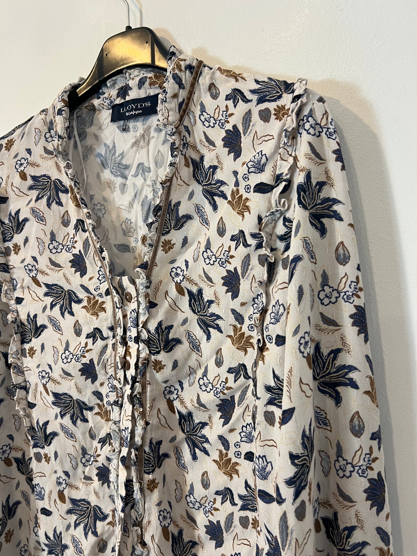LLOYD´S. Blusa fluida estamapda