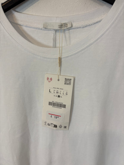 ZARA. Camiseta blanca volante