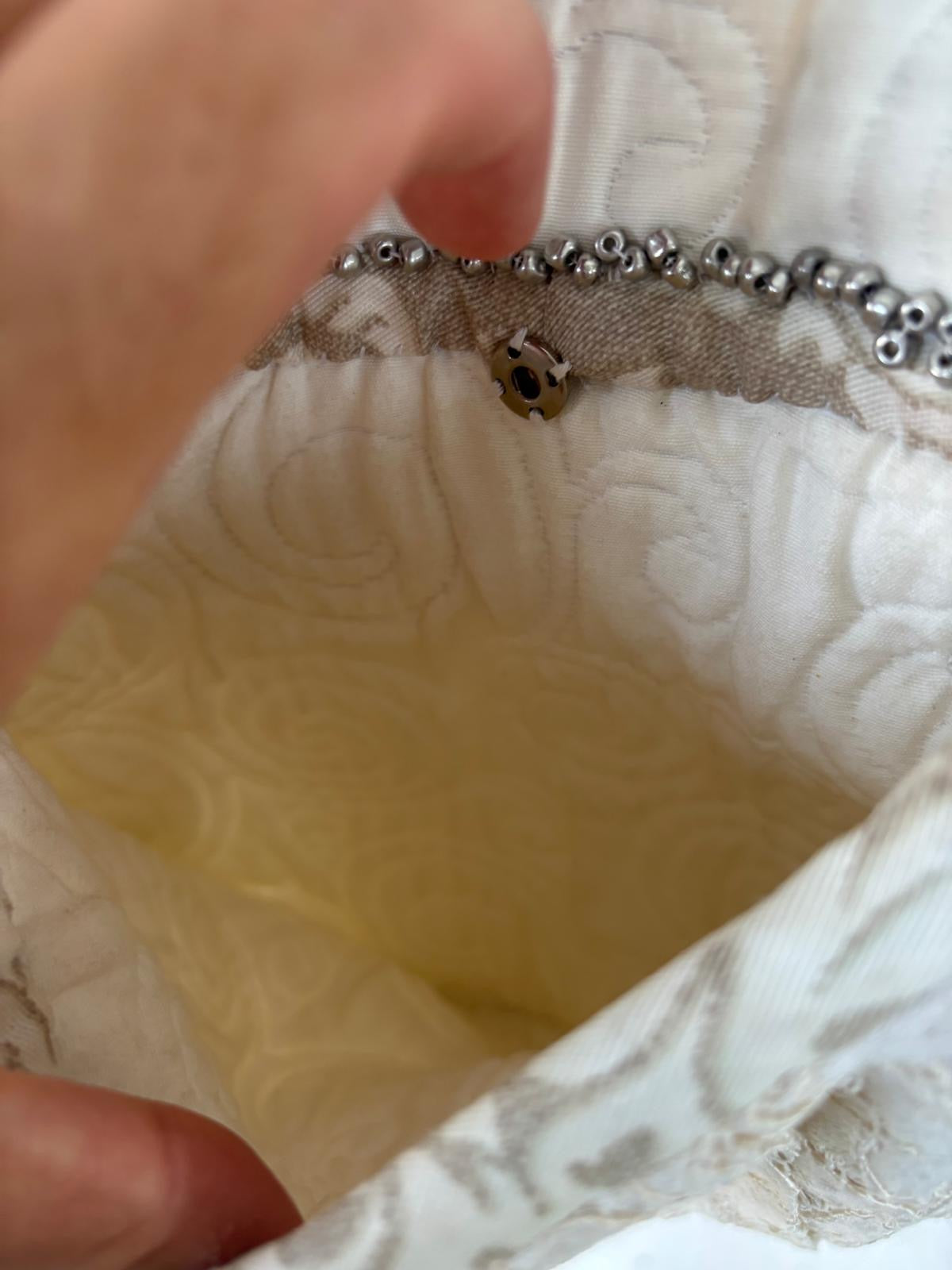 OTRAS. Bolso de hombro texturas