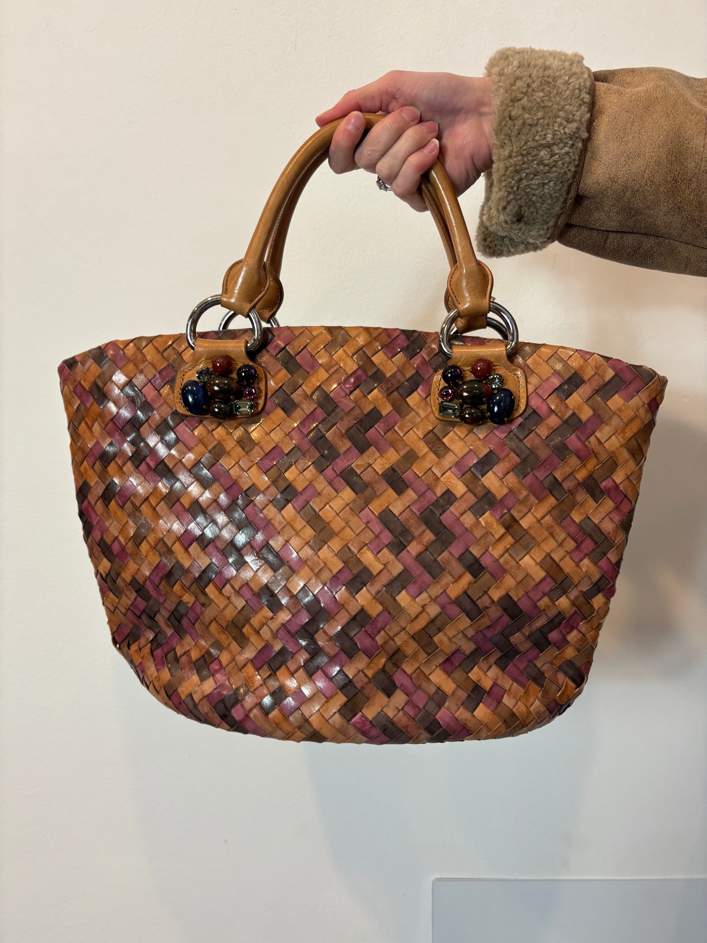 MIU MIU. Bolso trenzado piel