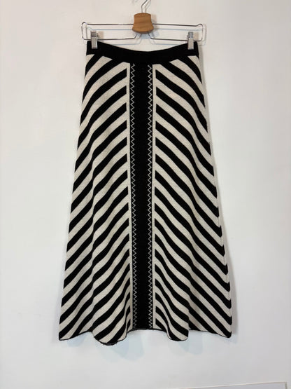 PANAMBI. Conjunto falda y jersey bicolor