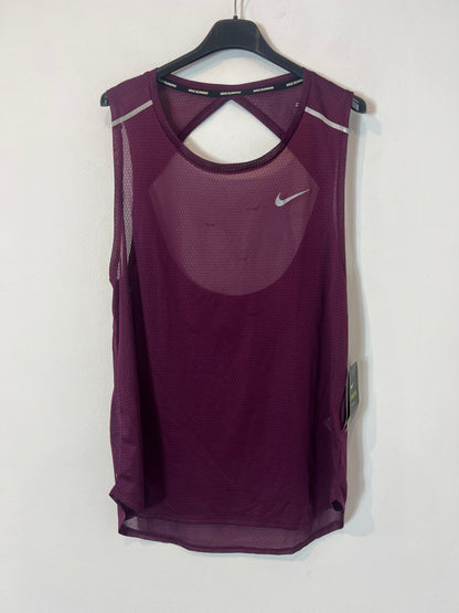 NIKE. Top burdeos running. T L