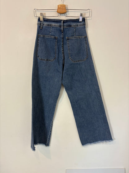 OTRAS. Denim cropped bolsillos