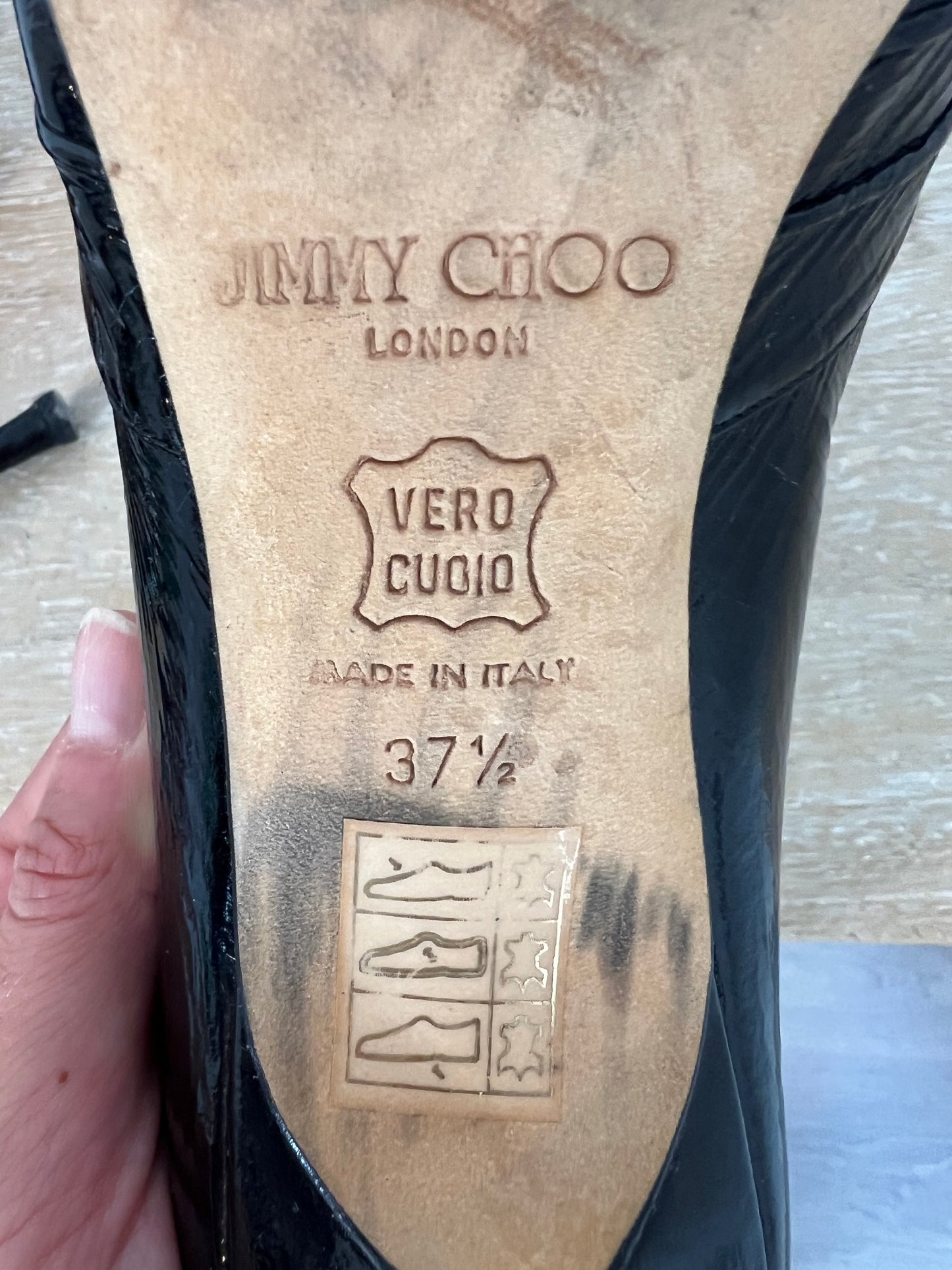 JIMMY CHOO. Black patent leather peeptoe heels. Size 37.5 (tare)