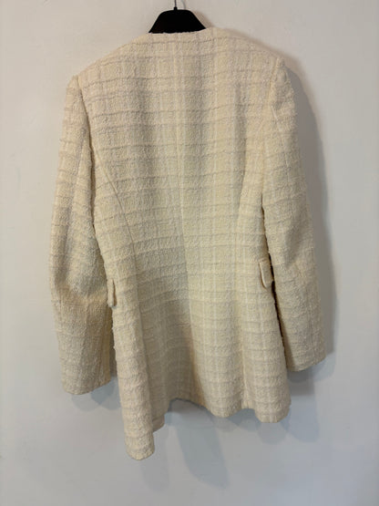 ZARA. Chaqueta tweed blanca