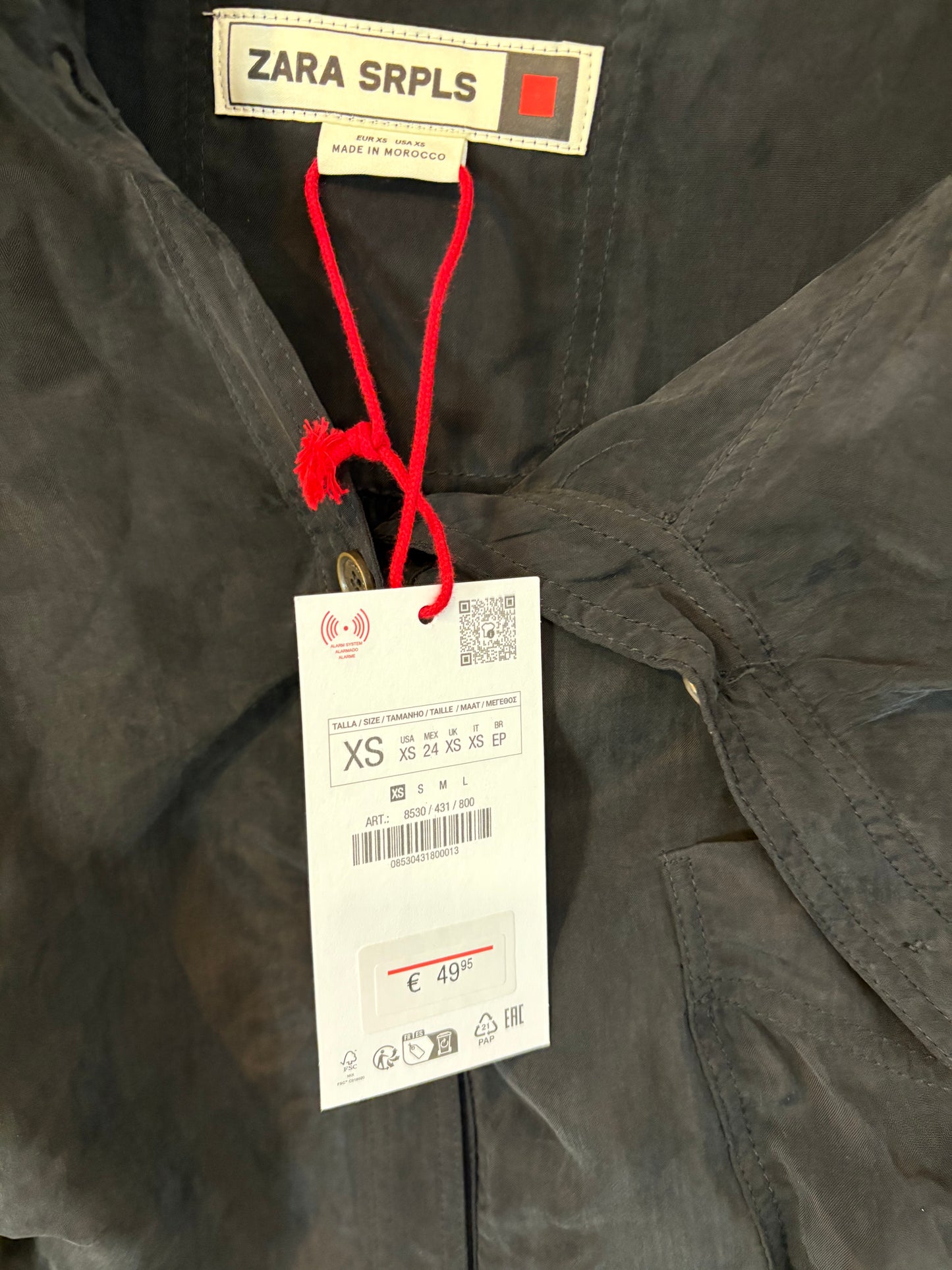 ZARA. Blusa fluida  botonadura lateral