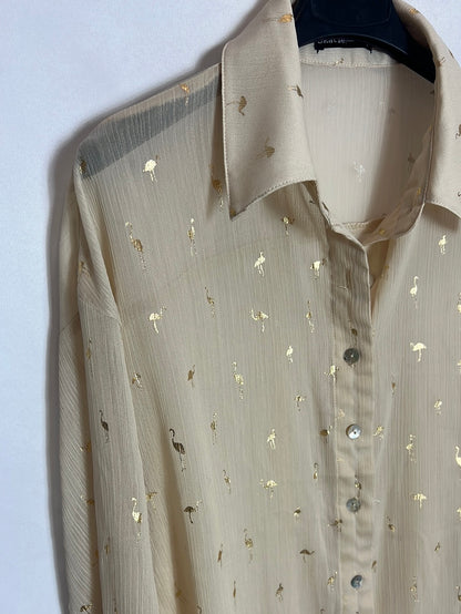 SKATÏE. Blusa beige semitransparente flamencos. T M