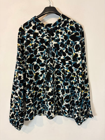 ZARA. Blusa estampada detalle cuello