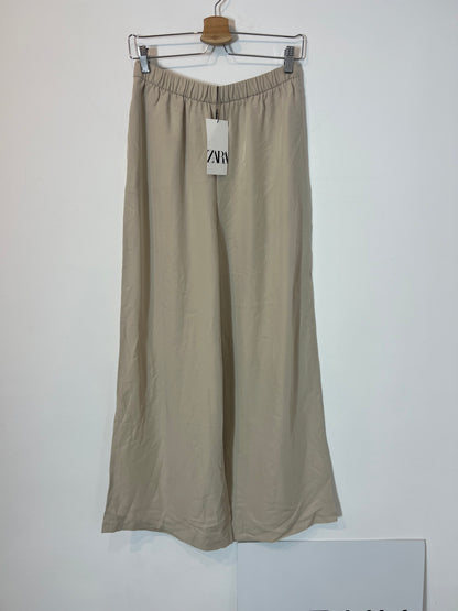 ZARA. Flowy beige wide-legged trousers. TS