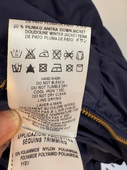 LOVE MOSCHINO. Plumas azul detalles T.36